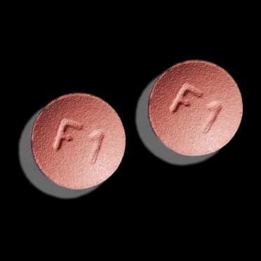 Finasteride pills with RocketRX branding