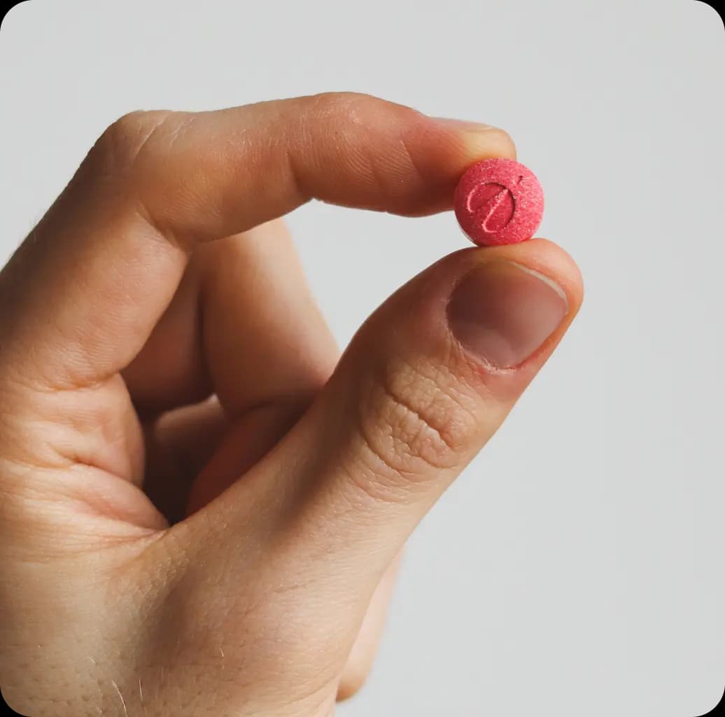 Person holding rocket tablet infront of envelope
