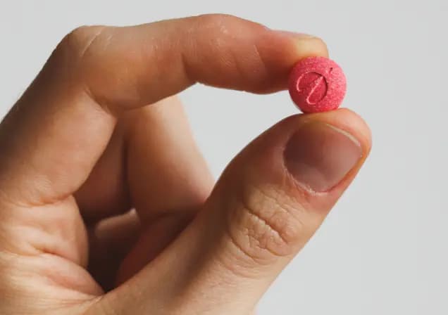 Person holding rocket tablet infront of envelope