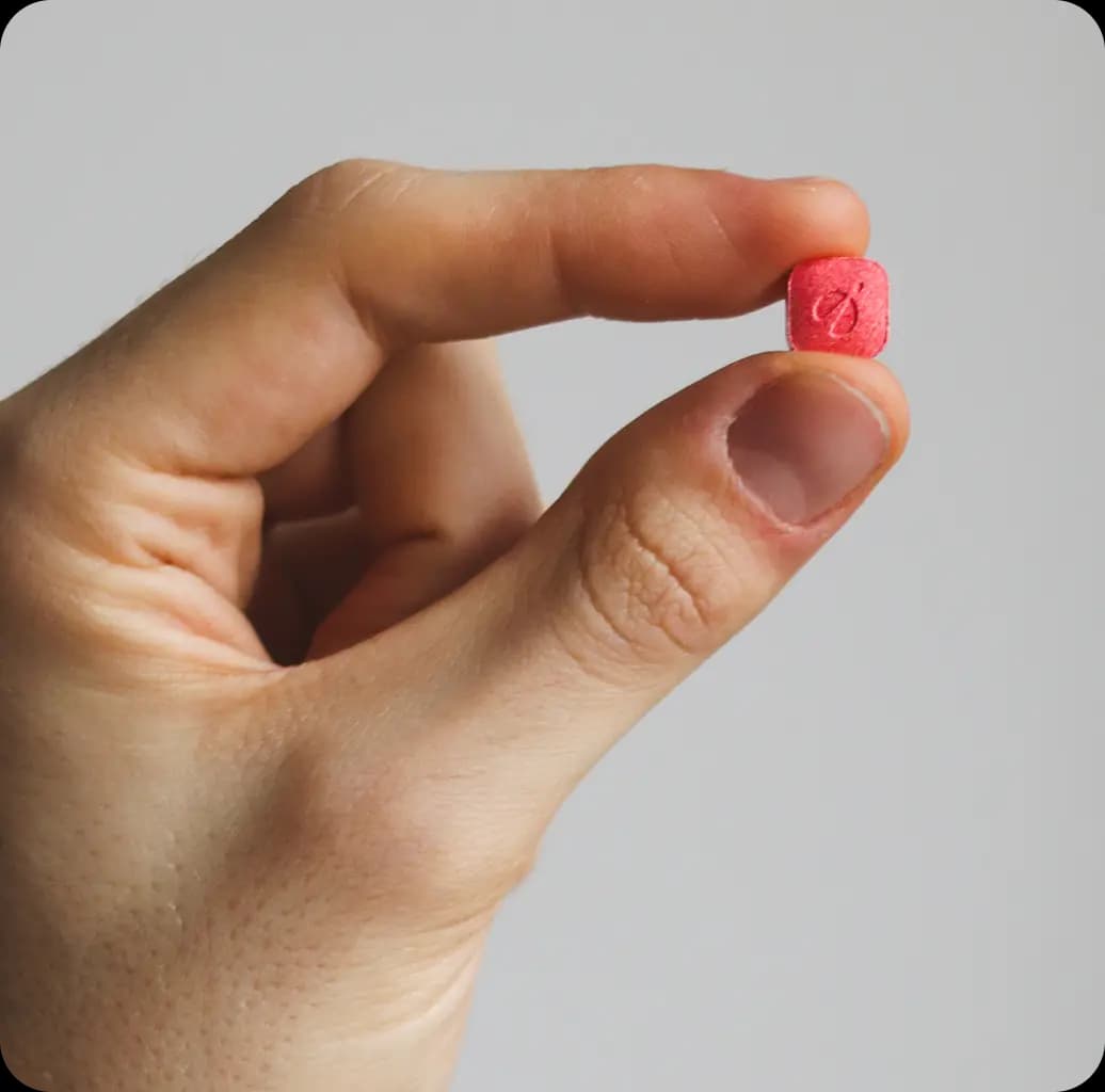 Person holding rocket tablet infront of envelope