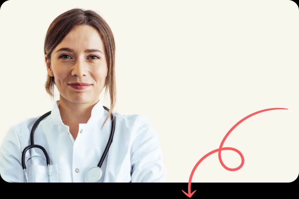 Doctor smiling with their arms crossed